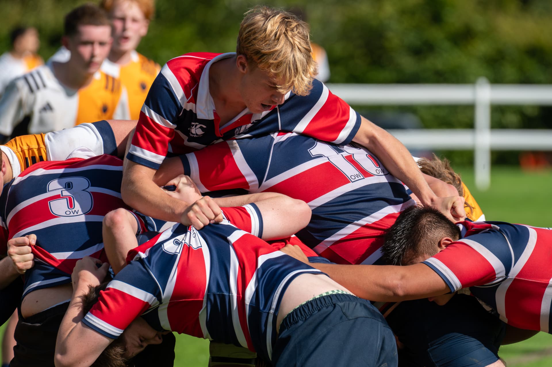 Rugby forwards competing in a scrum