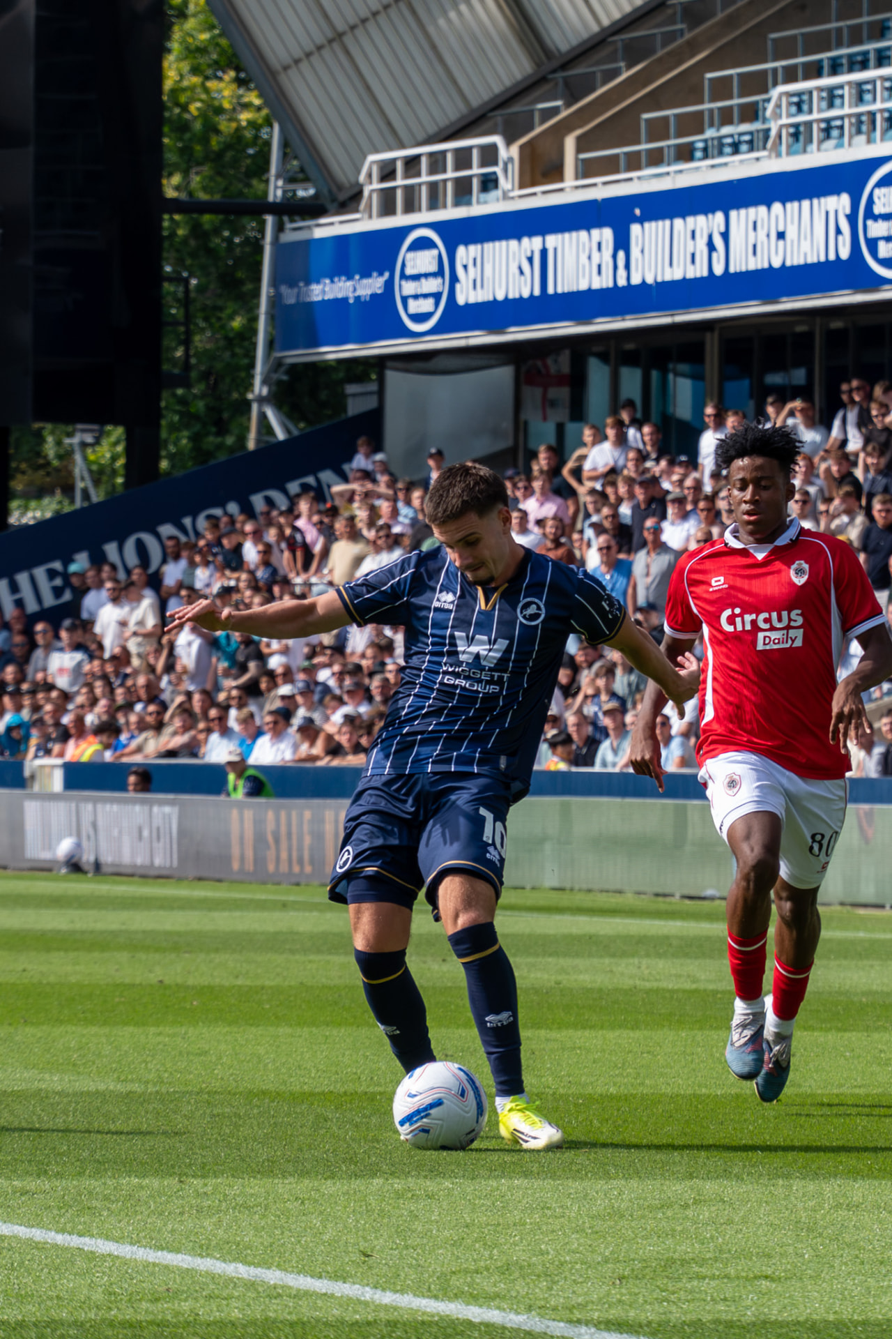 Millwall number 10 taking on a defender near the touchline