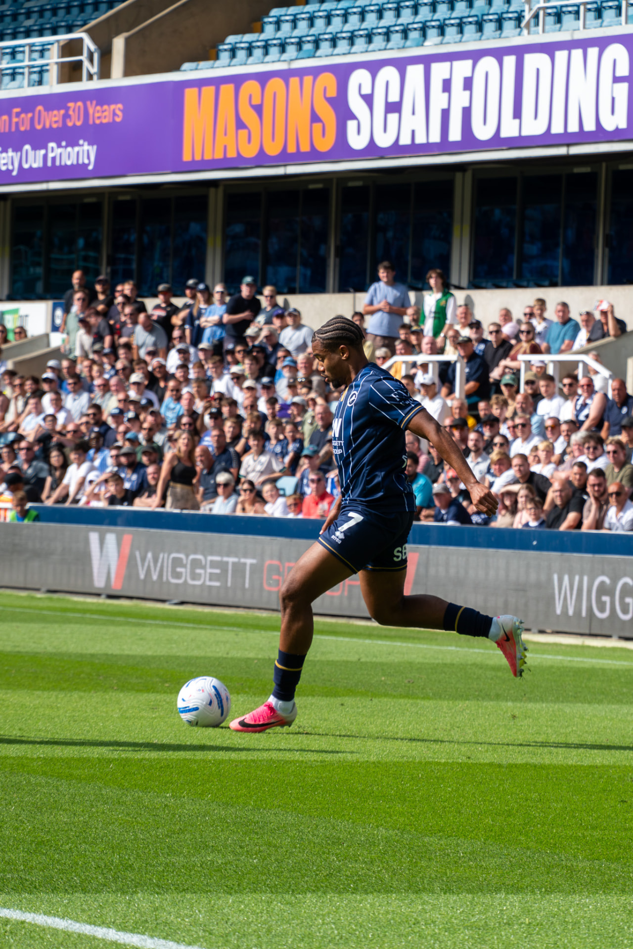 Millwall number 7 lining up a delivery from the wing