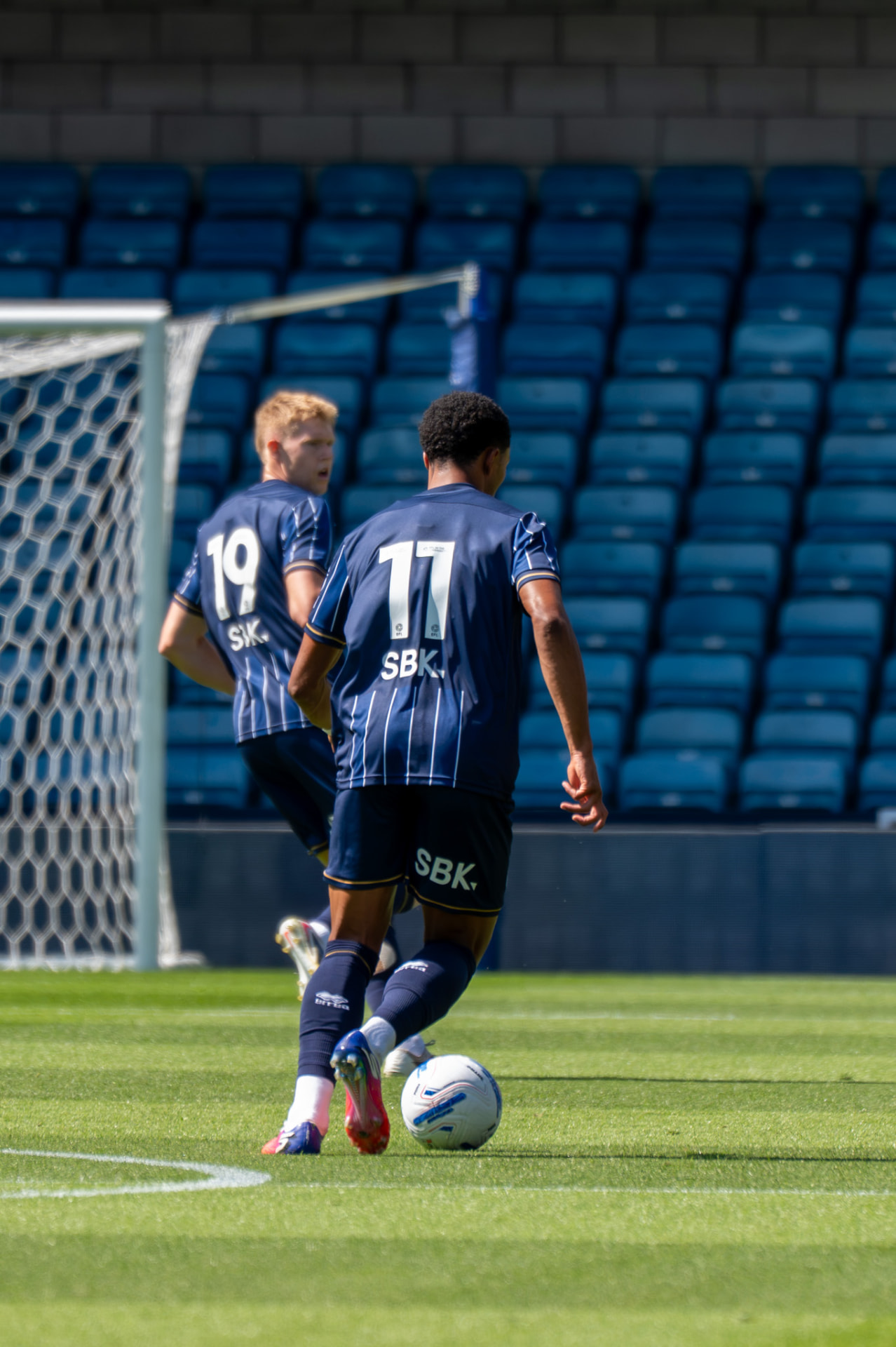 Two Millwall players building play from the back